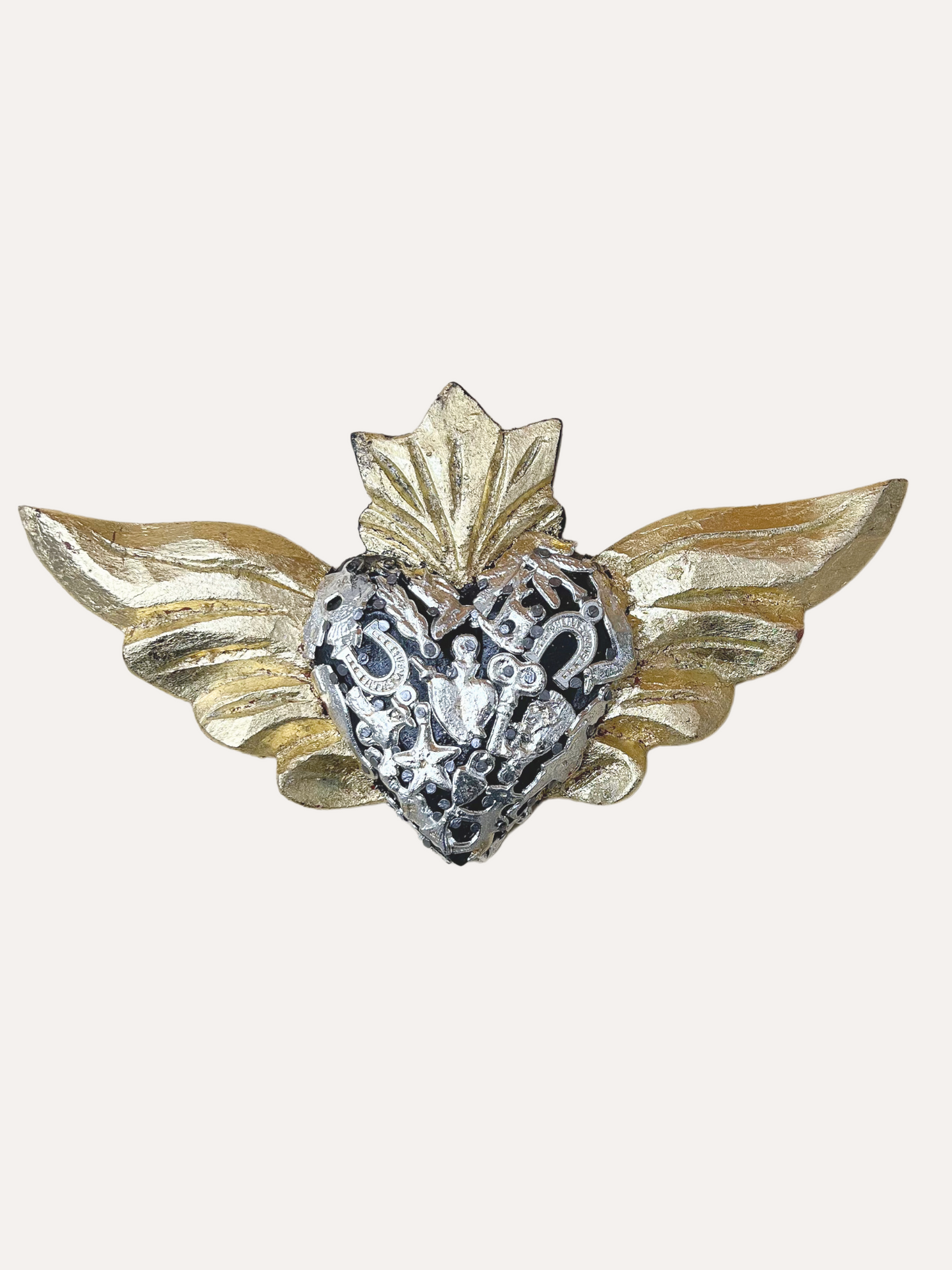 Winged milagrito gold amulet
