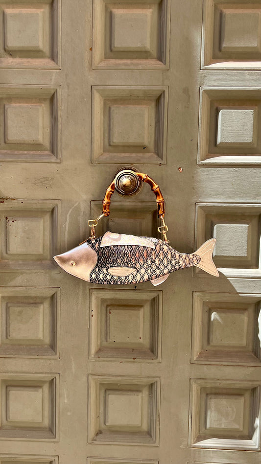 El pescado - oro